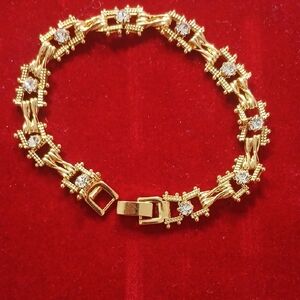 Elegant Gold Bracelet with Silver Accents